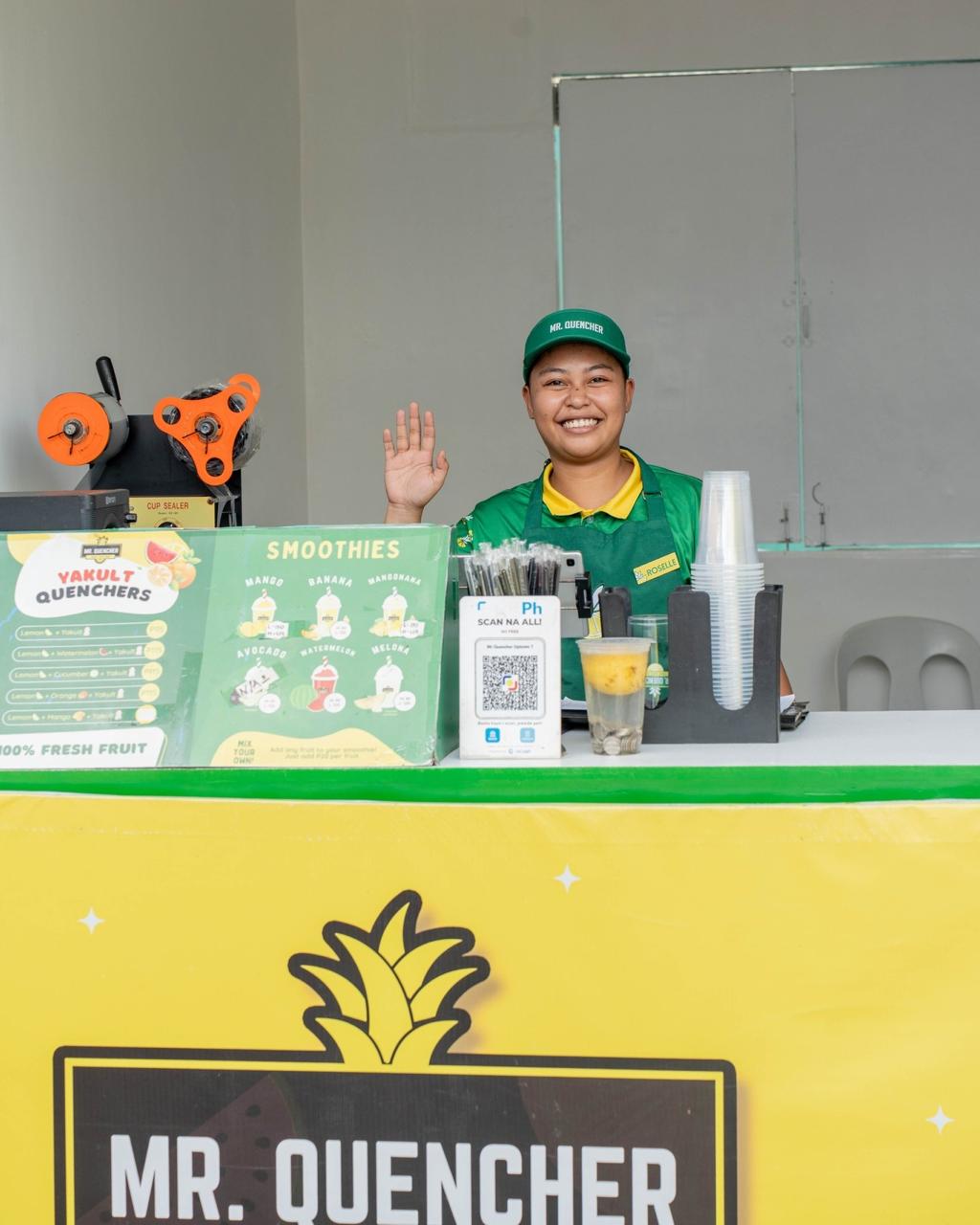 Staff at Mr. Quencher booth